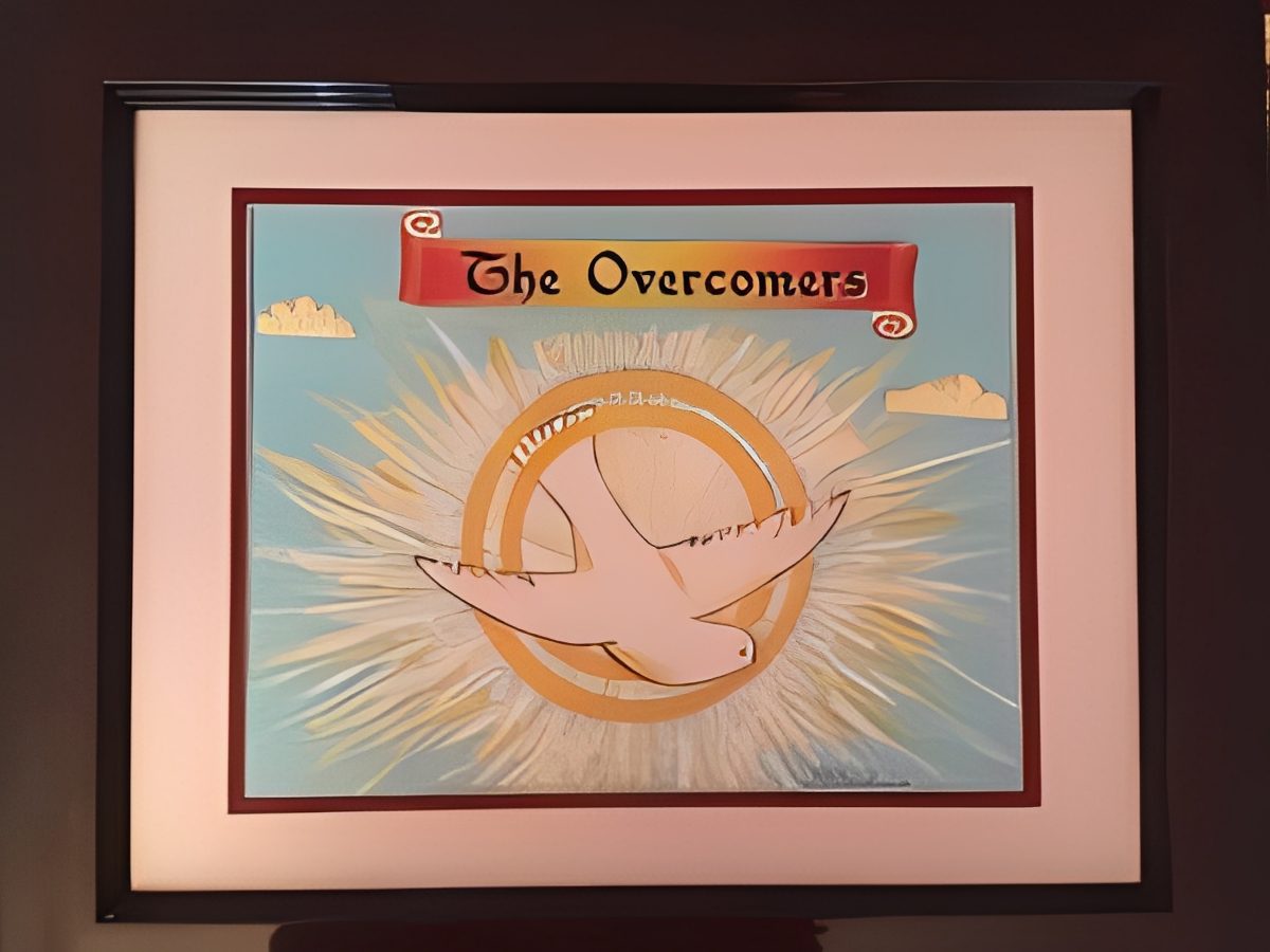 Framed artwork with dove and sunburst